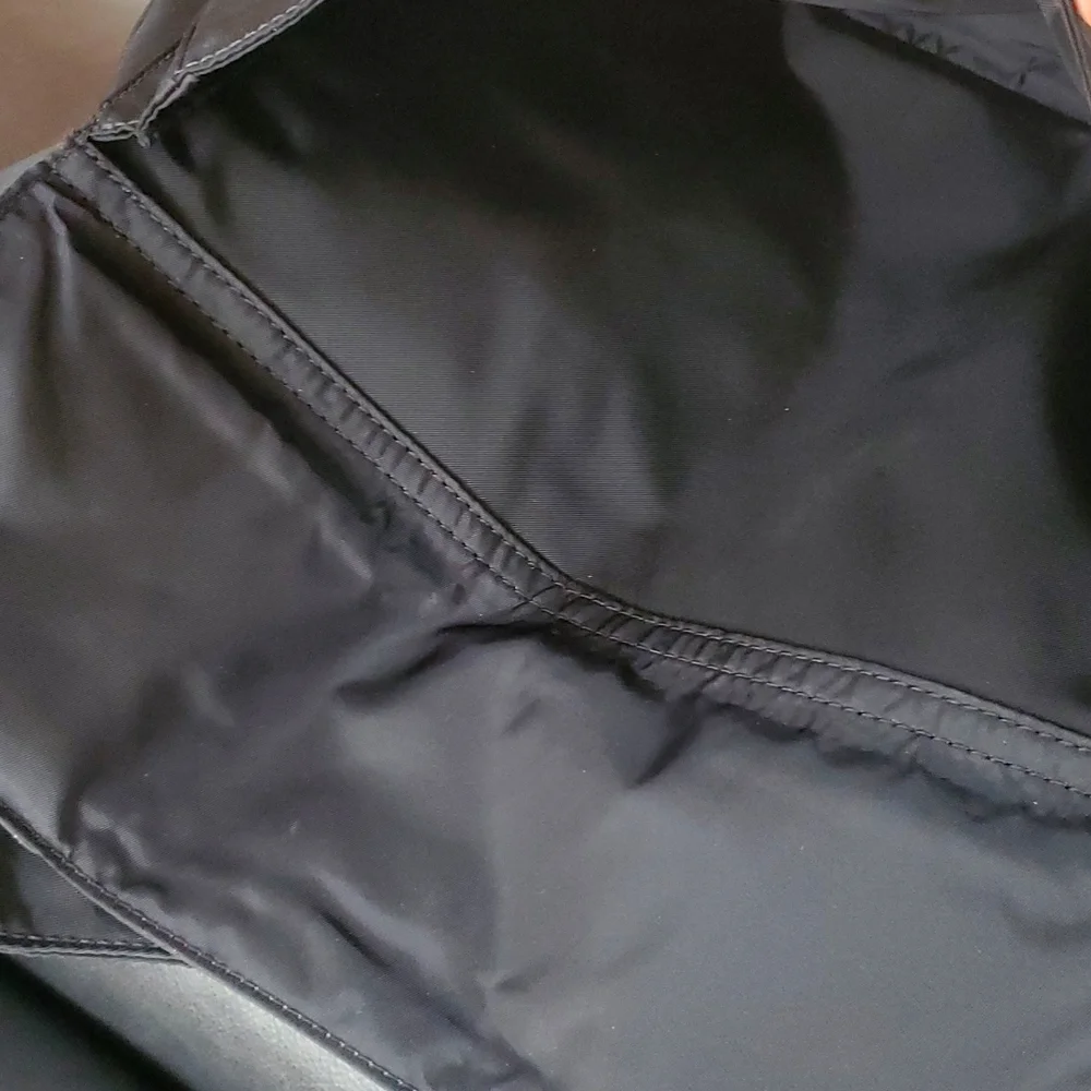 Tumi Pucket E/W Flap Crossbody Messenger Bag in Black/Silver/Leather…